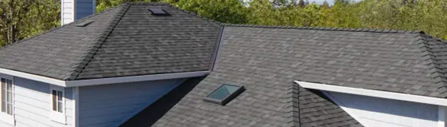 New roof installation with asphalt shingles